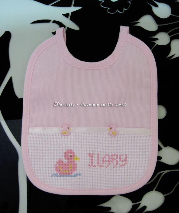 Bavette rosa con orsacchiotto e paperette per Ilary
