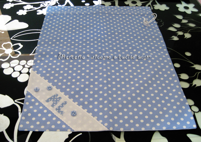 Sacchetti nascita pois celeste con iniziali