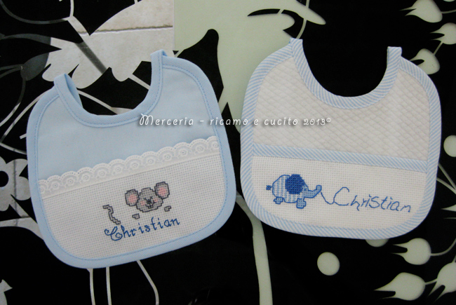 Fiocco nascita aeroplano celeste e bavette per Christian