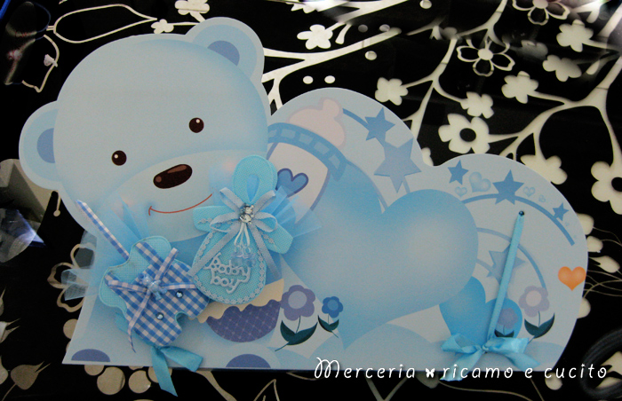 Sacchettino bomboniera portaconfetti a forma di ciuccio e tutina