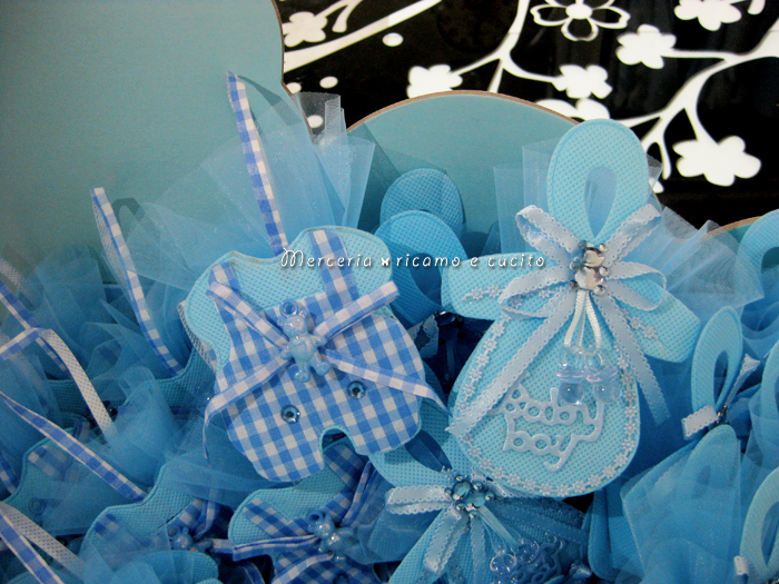 Sacchettino bomboniera portaconfetti a forma di ciuccio e tutina