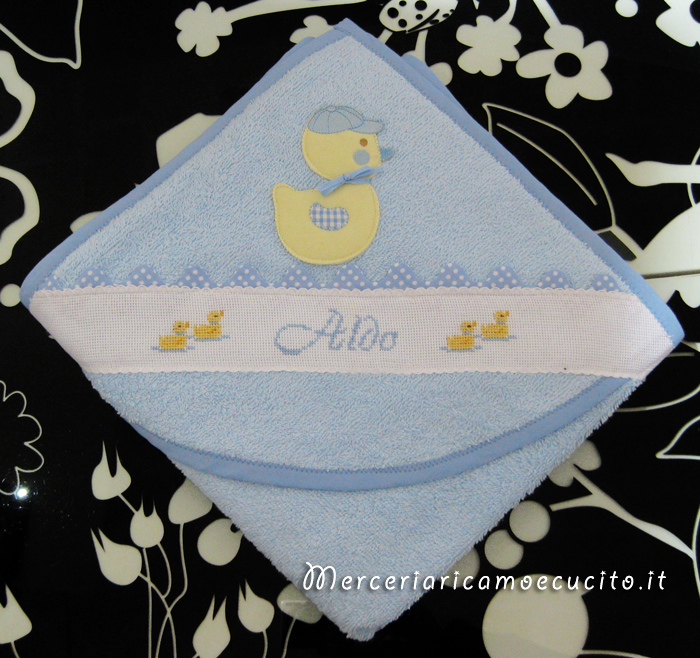 Fiocchi nascita e accappatoio per Aldo