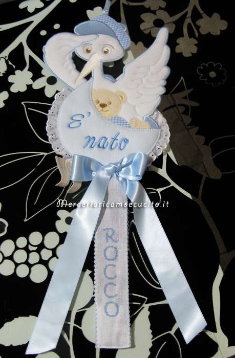 Fiocco nascita cicogna, bavette e busta portaoggetti per Rocco