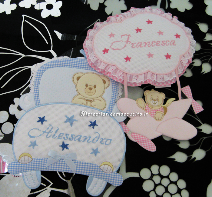 Fiocco nascita machina celeste per Alessandro e fiocco aeroplano rosa per Francesca