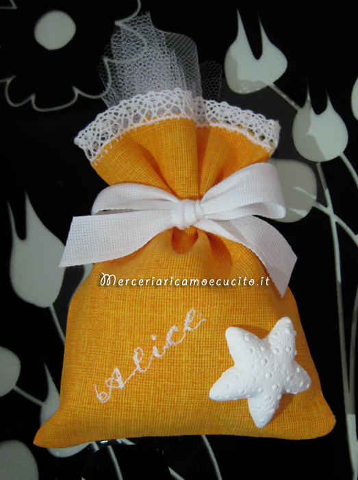 Sacchettini bomboniera portaconfetti con stella marina per Alice