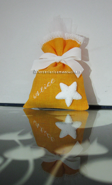 Sacchettini bomboniera portaconfetti con stella marina per Alice