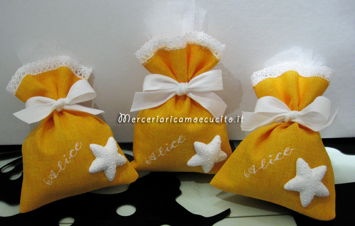 Sacchettini bomboniera portaconfetti con stella marina per Alice