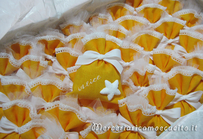 Sacchettini bomboniera portaconfetti con stella marina per Alice