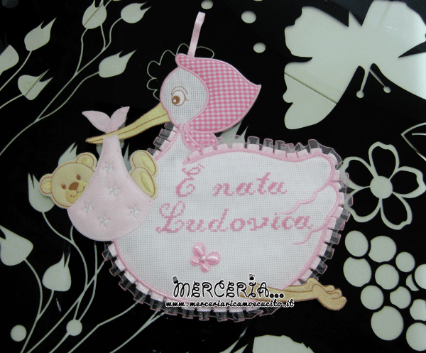 Fiocchi nascita carrozzina, sacco e cicogna per Ludovica