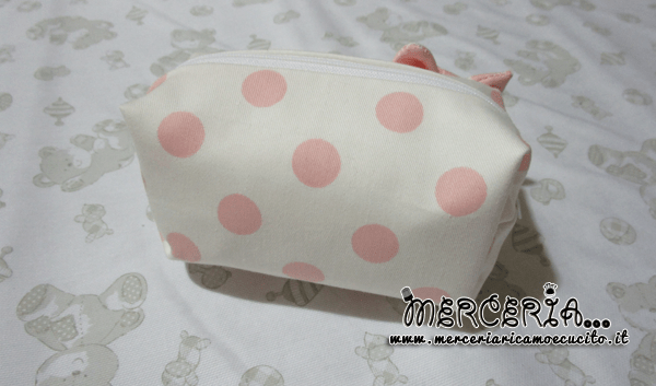 Pochette porta oggetti pois con fiocchetto