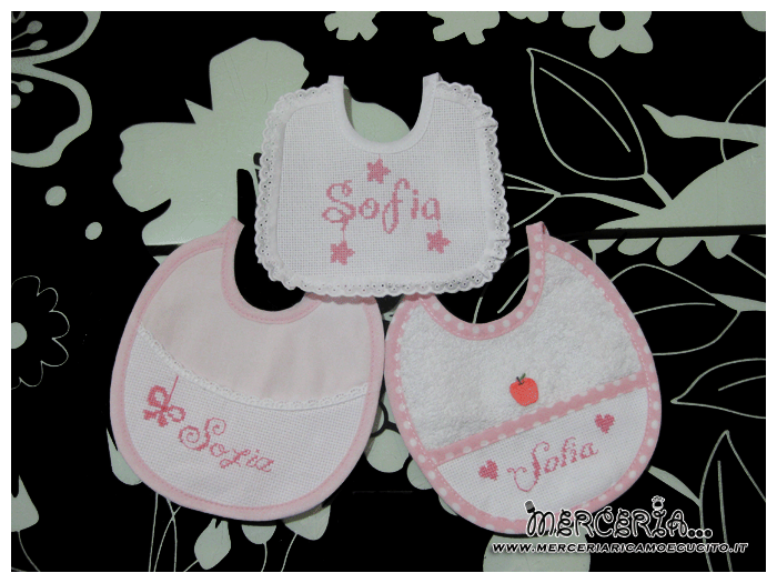 Fiocco nascita mongolfiera rosa, sacco farfalla e bavette prima misura per Sofia