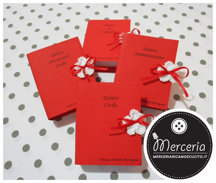 Bomboniera portaconfetti a forma di libro con esami laurea in giurisprudenza per la Dott.ssa Martegiani