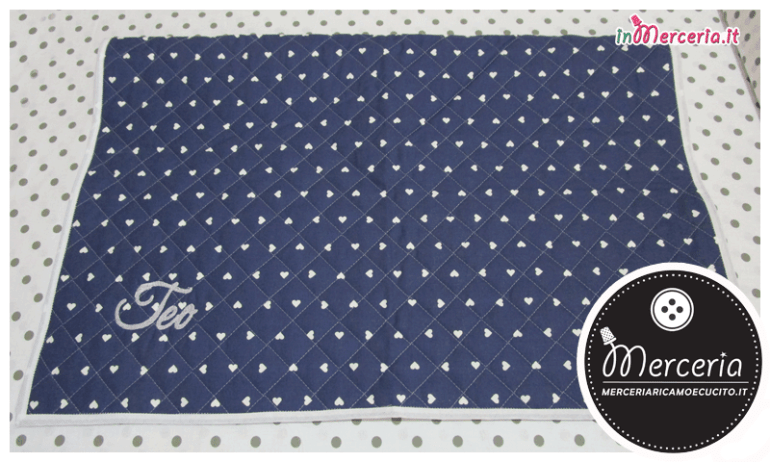 Copertina trapuntata blu fantasia con cuori