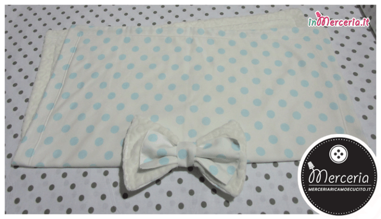 Copertina pois con fiocco
