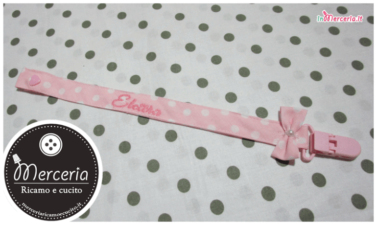 Beauty case stelle con pois rosa e clip portaciuccio per Elettra